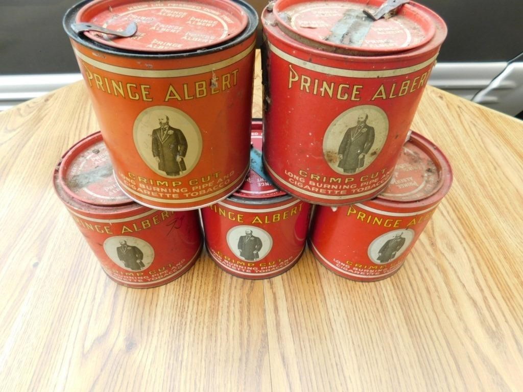 Five Prince Albert tobacco cans