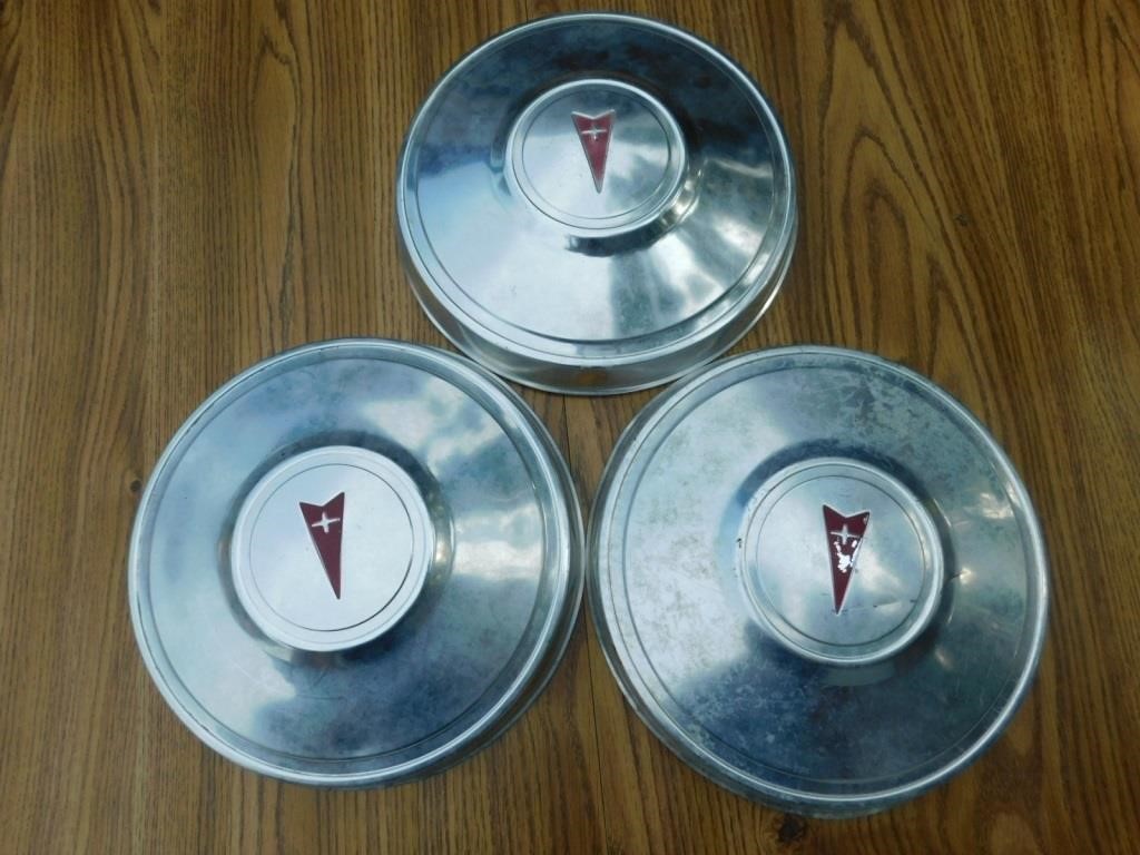 Three vintage Pontiac hub caps 10.5" dia.