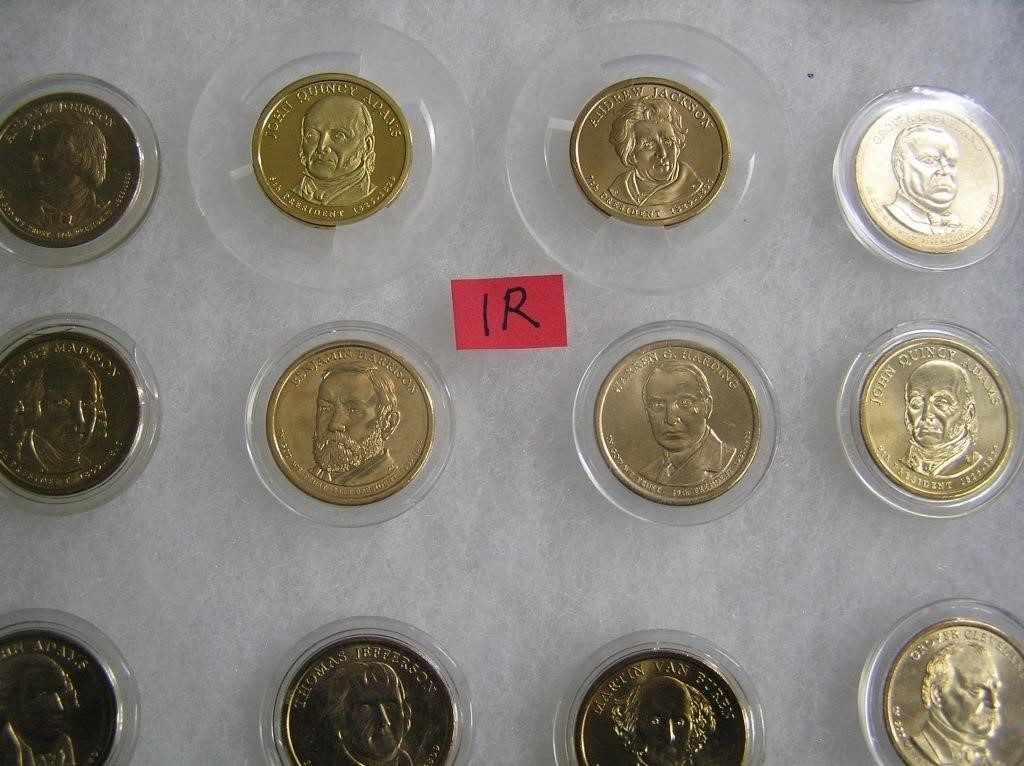 Group of uncirculated Golden Dollar coins