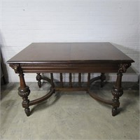 Antique Oak dining table. Has carved heads