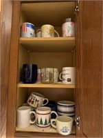 3 shelves of coffee mugs