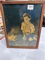BOY BESIDE CAMPFIRE PICTURE