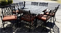 OUTDOOR IRON TABLE AND 8 CHAIRS,
