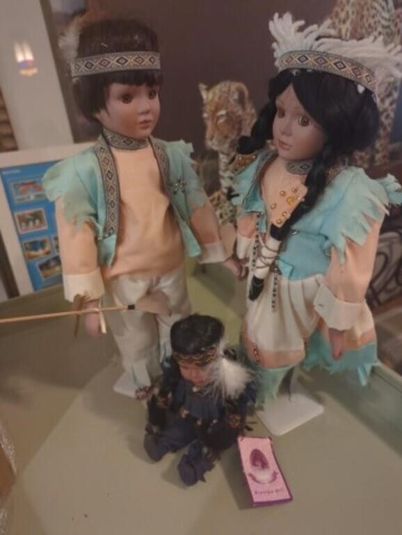 Set of 3 porcelain dolls. 2 big ones are approx