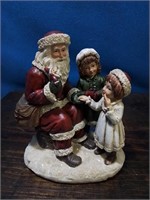 Santa figure with 2 little girls very sweet