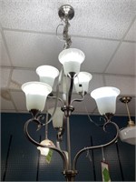 Multi tiered light chandelier style