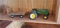 John Deere die cast toy tractor with hay rack