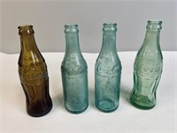 COLLECTION OF EARLY COKE BOTTLES
