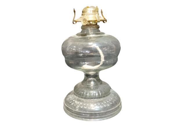 Elegant Clear Glass Lamp with Gold Top and Decorat