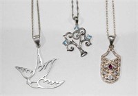 Qty of pendants to incl. sterling silver dove