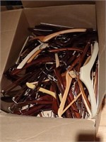 Box of wooden hangers, some plastic
