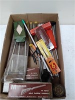 Large group of gun cleaning accessories