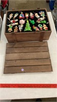 Wooden box with Christmas ornaments.