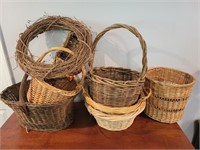 7 ASSORTED BASKETS AND A GRAPEVINE WREATH