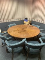 Large round conference table and six chairs