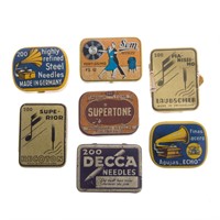 Seven assorted phonograph needle tins
