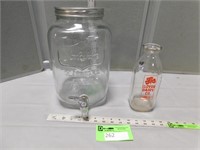 Antique Clover Dairy bottle and a beverage dispens