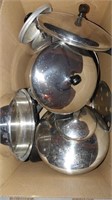 box of Farberware pots and pans with lids