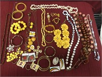 36 assorted pieces of costume jewelry. Necklaces,