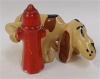 Spotted Hound Dog with Red Fire Hydrant