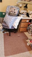 Rolling office chair w/ roll mat, bedding & ....