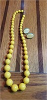 Yellow beaded necklace and earrings