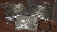 3 Hansen's metal train keychains 2 inch by 1.5