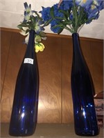 2 cobalt bottles with decor flowers