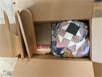 Box of quilted fabric