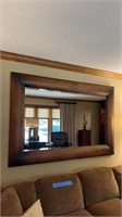 Large wood frame Mirror approximately 43” x 68”.