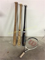 3 bats and a small tennis racquet