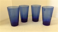 Set of four glass beverage glasses measuring six