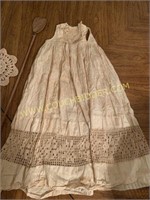 Antique baby dress buggy whip and doily