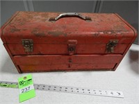 Metal toolbox with assorted tools and sockets