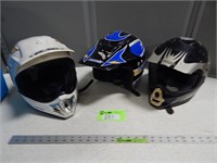 Assorted helmets in a tote; no lid; buyer confirm