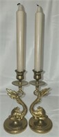 Pair of brass dolphin candle holders
