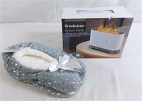 Women's slippers and Brookstone ambient flame
