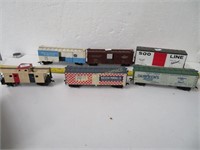 Five HO Scale Box Cars and one Caboose