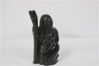 A Spinach Jade Figurine