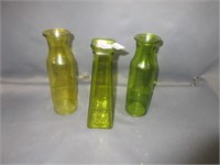 green glass bottles .