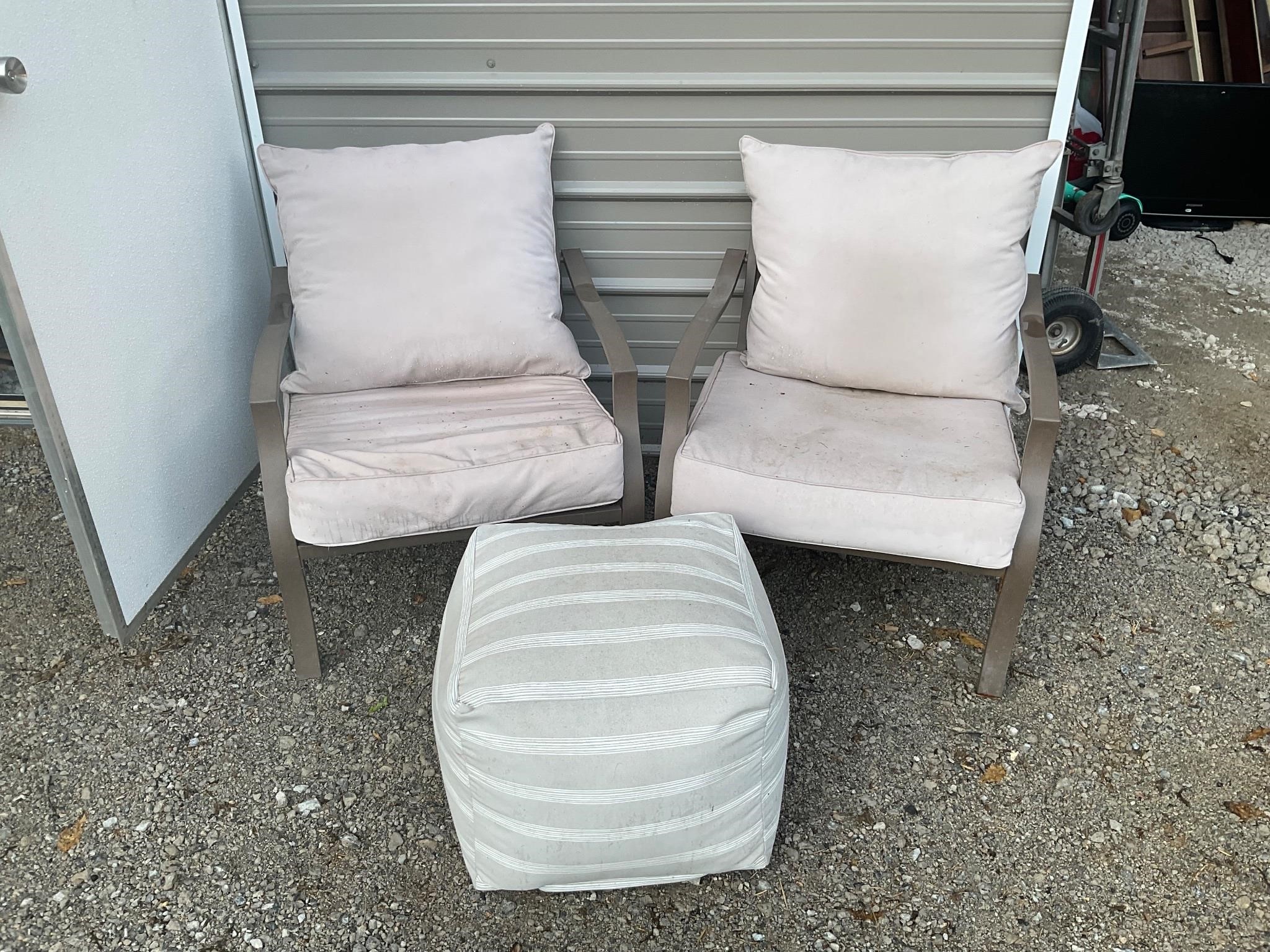 Two outdoor patio chairs, and footstool