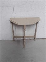 Small end table 24 in high by 23 in long