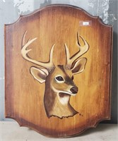 About a 16" x 20" Plaque with Deer Head Picture