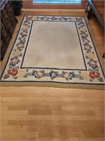 Beige w/ Floral Rim Area Rug is 8 X 10'