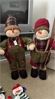 Two standing snowman Christmas decorations