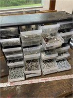 Plastic drawer organizer filled with washers nuts
