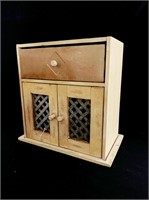 Small wooden storage container with two doors with