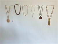 Set of 7 Elegant Gold-Tone Necklaces