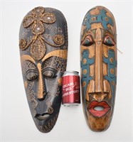 2 masques africains en bois sculpté