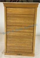 Antique oak roll front cabinet made by national